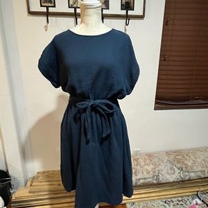 Cute navy blue dress with wrap tie.
